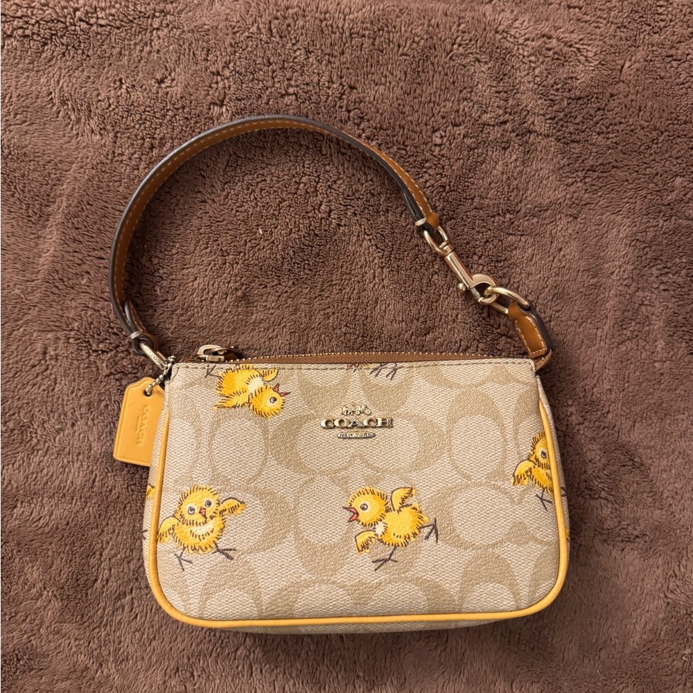 Coach Nolita 15 In Signature Canvas with Tossed Chick Print CC419